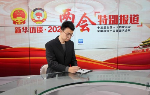 媒體報(bào)道新裝備——訊飛智能辦公本