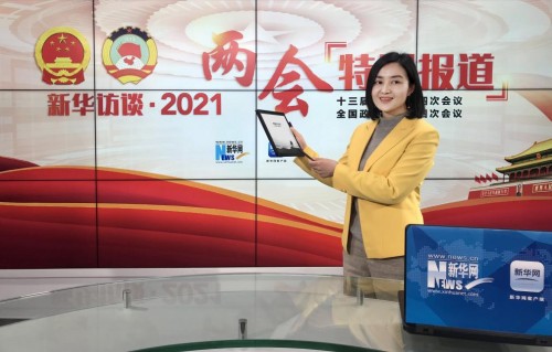 媒體報(bào)道新裝備——訊飛智能辦公本